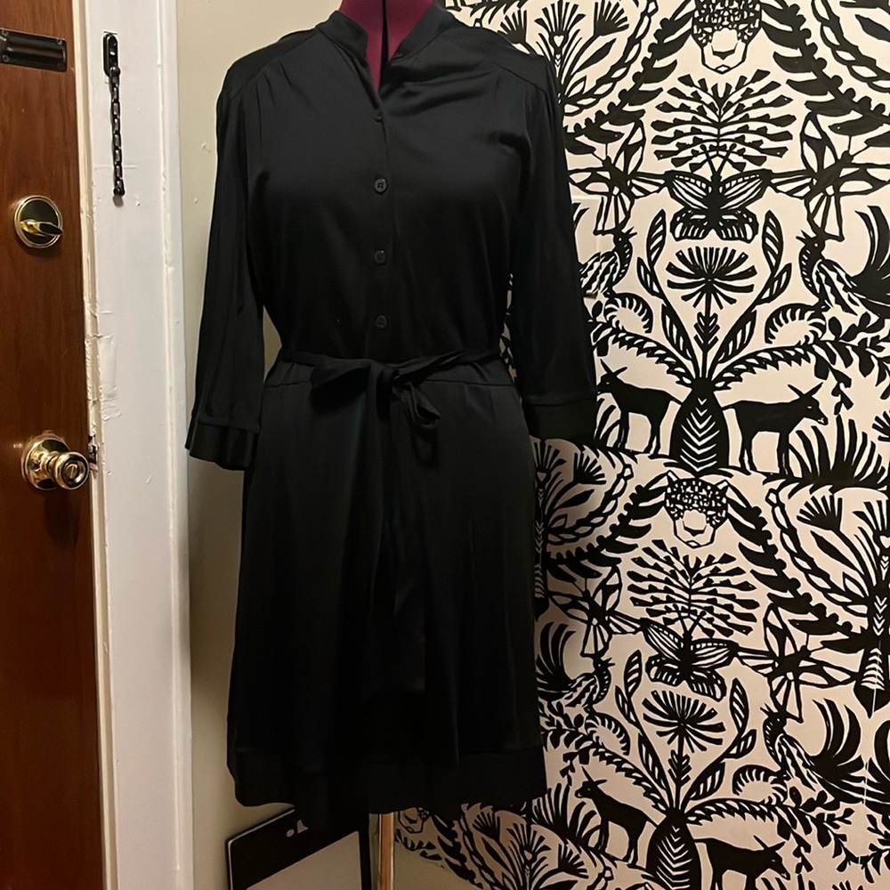The limited black button front dress size L